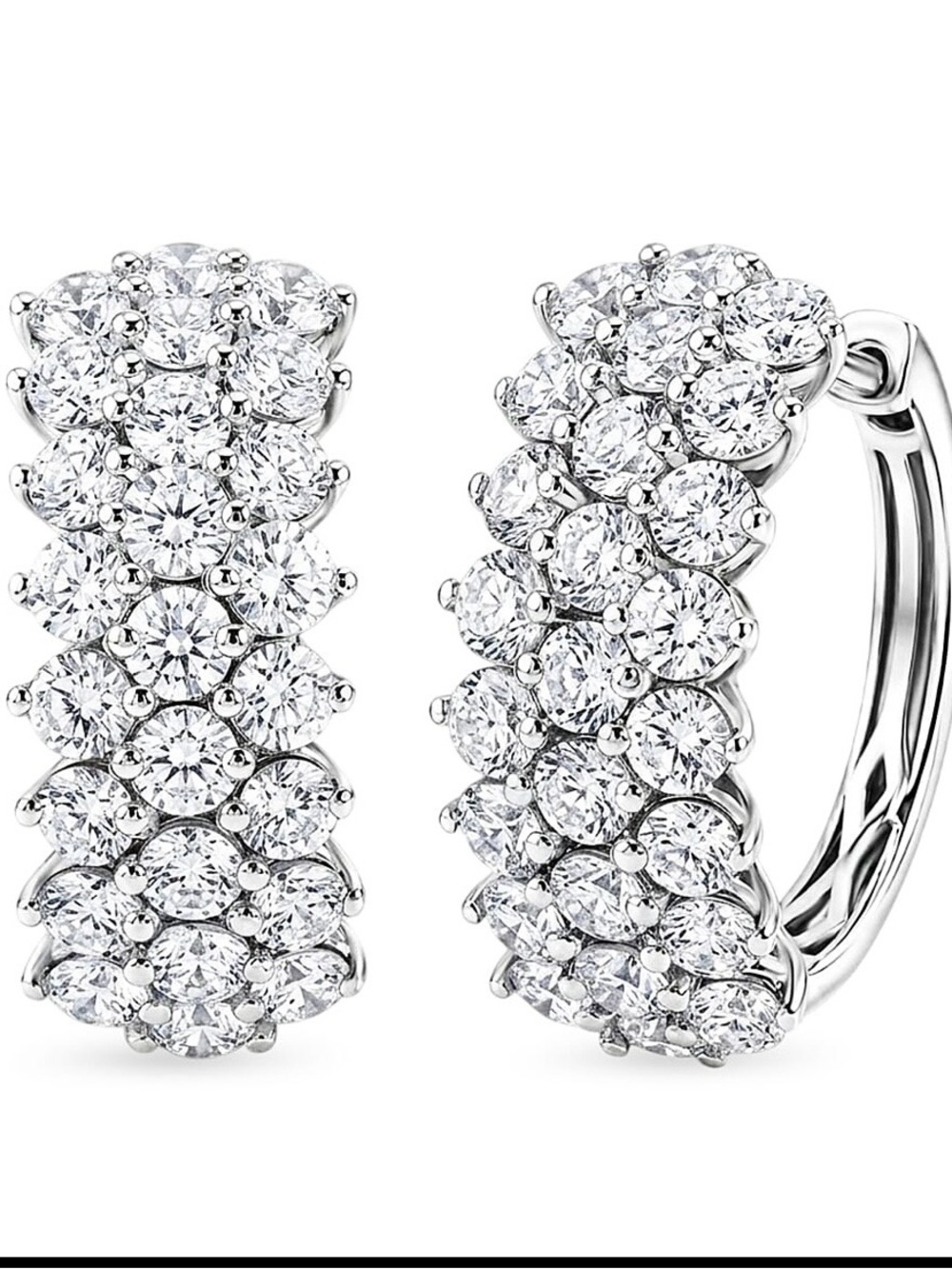 sterling silver.
The delicate floral design blooms with lustrous gemstones,